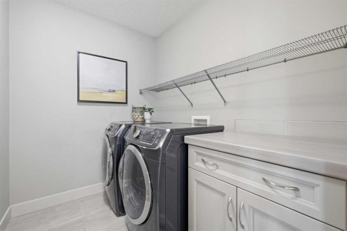 86 Panton View Nw, Calgary, AB - Indoor Photo Showing Laundry Room