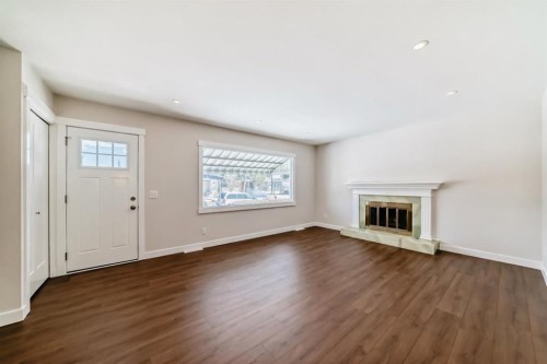 7427 25 Street Se, Calgary, AB - Indoor With Fireplace