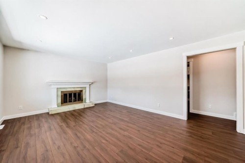 7427 25 Street Se, Calgary, AB - Indoor With Fireplace