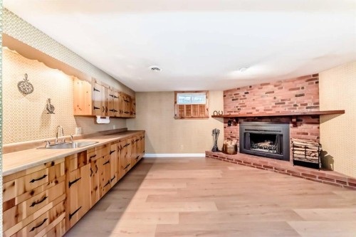 7427 25 Street Se, Calgary, AB - Indoor Photo Showing Other Room With Fireplace