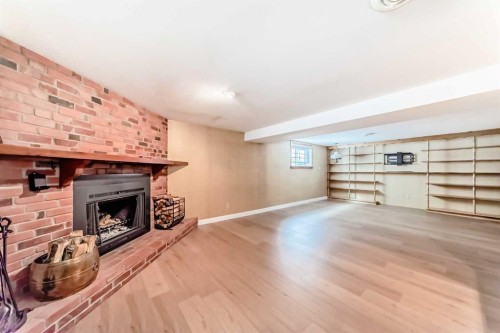7427 25 Street Se, Calgary, AB - Indoor With Fireplace