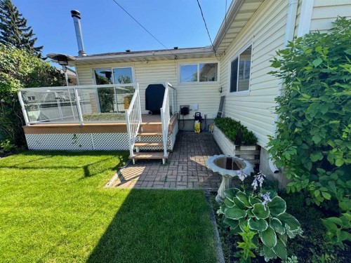7427 25 Street Se, Calgary, AB - Outdoor With Deck Patio Veranda