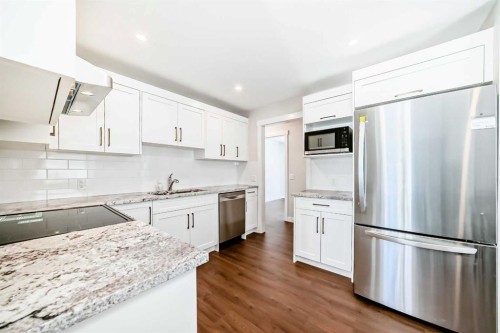 7427 25 Street Se, Calgary, AB - Indoor Photo Showing Kitchen With Stainless Steel Kitchen With Upgraded Kitchen