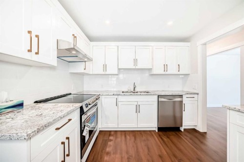 7427 25 Street Se, Calgary, AB - Indoor Photo Showing Kitchen With Stainless Steel Kitchen With Upgraded Kitchen