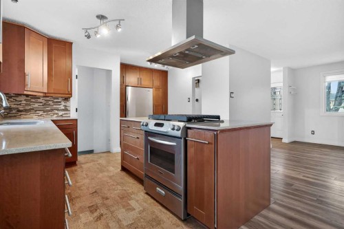 81 Westminster Drive Sw, Calgary, AB - Indoor Photo Showing Kitchen With Double Sink