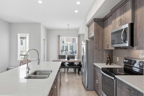 95 Nolanlake Cove Nw, Calgary, AB - Indoor Photo Showing Kitchen With Stainless Steel Kitchen With Double Sink With Upgraded Kitchen