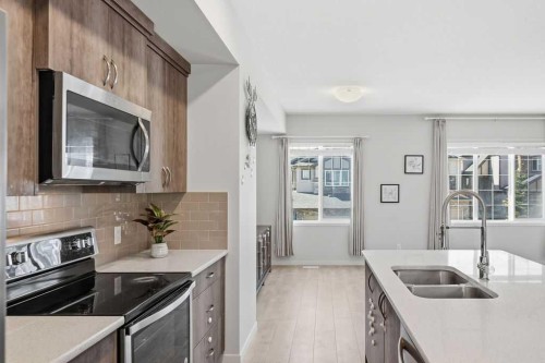 95 Nolanlake Cove Nw, Calgary, AB - Indoor Photo Showing Kitchen With Stainless Steel Kitchen With Double Sink With Upgraded Kitchen
