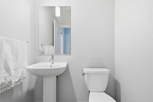902 Bluerock Way Sw, Calgary, AB - Indoor Photo Showing Bathroom