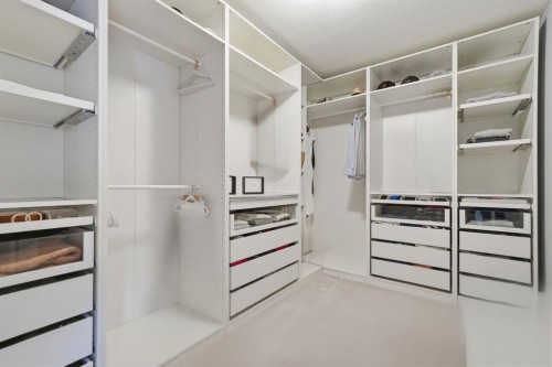 902 Bluerock Way Sw, Calgary, AB - Indoor With Storage