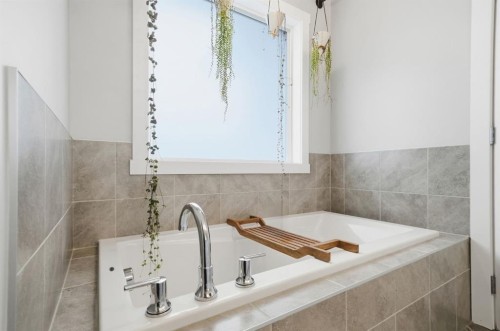 902 Bluerock Way Sw, Calgary, AB - Indoor Photo Showing Bathroom