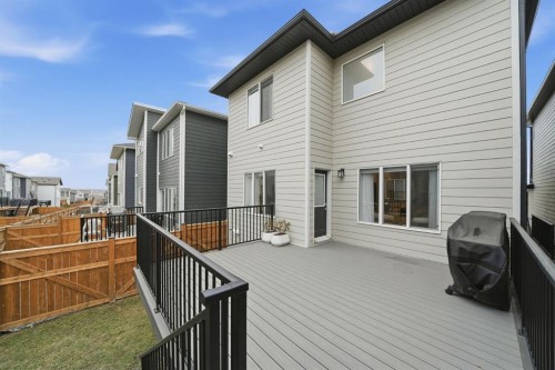 902 Bluerock Way Sw, Calgary, AB - Outdoor With Deck Patio Veranda With Exterior