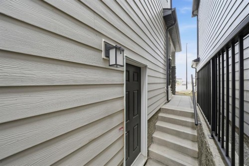 902 Bluerock Way Sw, Calgary, AB - Outdoor With Exterior