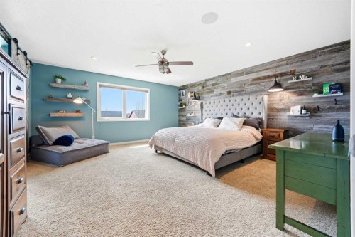 6 Ranchers Manor, Okotoks, AB - Indoor Photo Showing Bedroom