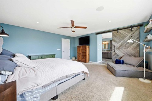 6 Ranchers Manor, Okotoks, AB - Indoor Photo Showing Bedroom