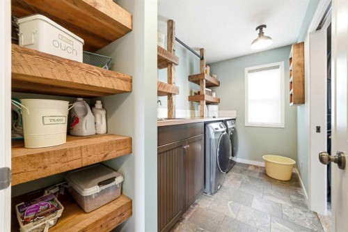 6 Ranchers Manor, Okotoks, AB - Indoor Photo Showing Laundry Room