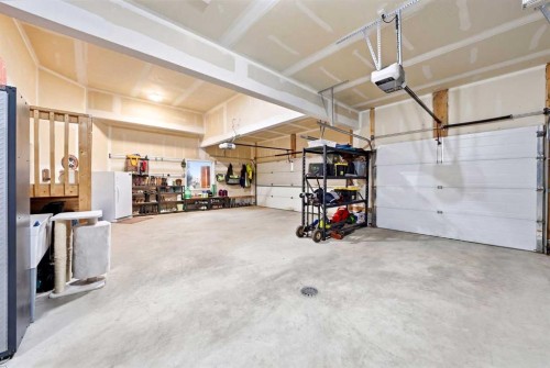 6 Ranchers Manor, Okotoks, AB - Indoor Photo Showing Garage