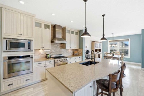 6 Ranchers Manor, Okotoks, AB - Indoor Photo Showing Kitchen With Double Sink With Upgraded Kitchen