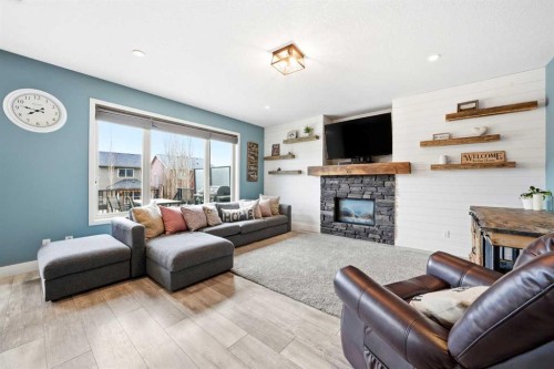 6 Ranchers Manor, Okotoks, AB - Indoor Photo Showing Living Room With Fireplace