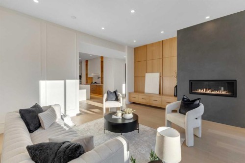 1321 10 Avenue Se, Calgary, AB - Indoor Photo Showing Living Room With Fireplace