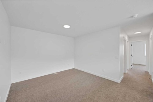 82 Heritage Circle, Cochrane, AB - Indoor Photo Showing Other Room