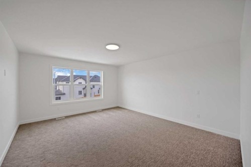 82 Heritage Circle, Cochrane, AB - Indoor Photo Showing Other Room
