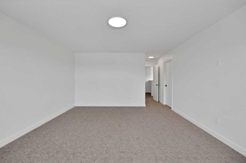 82 Heritage Circle, Cochrane, AB - Indoor Photo Showing Other Room