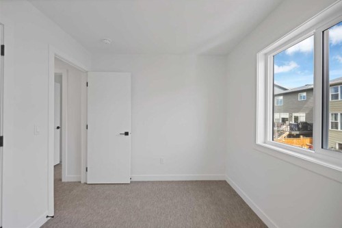 82 Heritage Circle, Cochrane, AB - Indoor Photo Showing Other Room