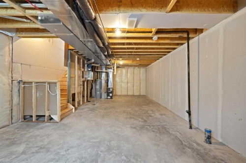 82 Heritage Circle, Cochrane, AB - Indoor Photo Showing Basement
