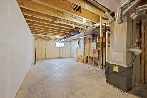 82 Heritage Circle, Cochrane, AB - Indoor Photo Showing Basement