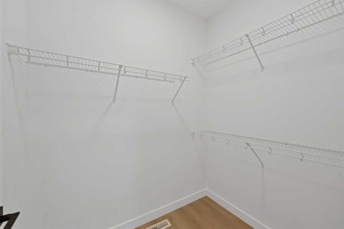 82 Heritage Circle, Cochrane, AB - Indoor With Storage