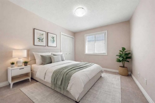 529 Saddlelake Drive Ne, Calgary, AB - Indoor Photo Showing Bedroom