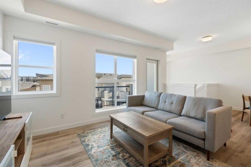 132 Spring Creek Common Sw, Calgary, AB - Indoor Photo Showing Living Room