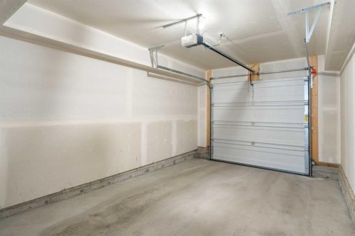 132 Spring Creek Common Sw, Calgary, AB - Indoor Photo Showing Garage