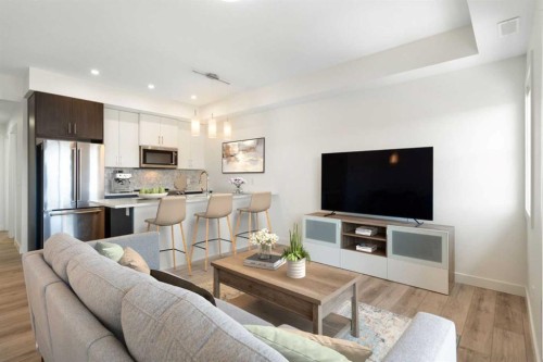132 Spring Creek Common Sw, Calgary, AB - Indoor Photo Showing Living Room