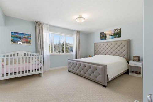 18 Royal Crest Way Nw, Calgary, AB - Indoor Photo Showing Bedroom