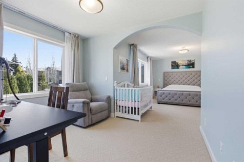 18 Royal Crest Way Nw, Calgary, AB - Indoor Photo Showing Bedroom