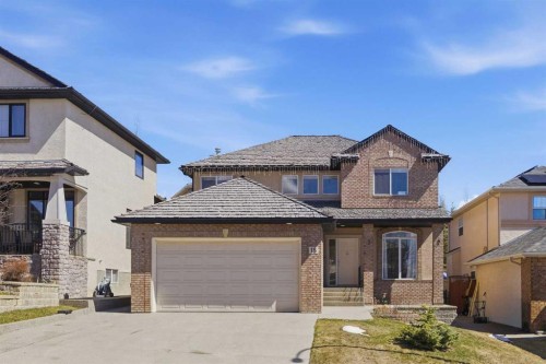 18 Royal Crest Way Nw, Calgary, AB - Outdoor With Facade