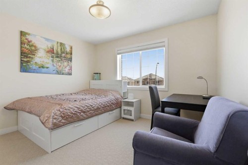 18 Royal Crest Way Nw, Calgary, AB - Indoor Photo Showing Bedroom