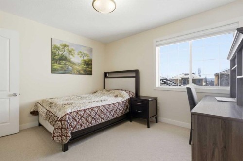 18 Royal Crest Way Nw, Calgary, AB - Indoor Photo Showing Bedroom