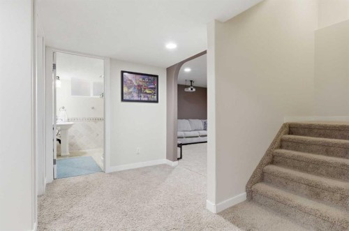 18 Royal Crest Way Nw, Calgary, AB - Indoor Photo Showing Other Room
