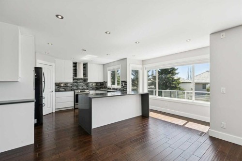 15 Springbank View Sw, Calgary, AB - Indoor Photo Showing Kitchen With Upgraded Kitchen