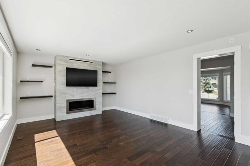 15 Springbank View Sw, Calgary, AB - Indoor With Fireplace