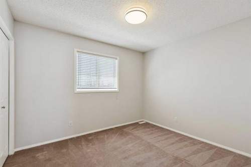 15 Springbank View Sw, Calgary, AB - Indoor Photo Showing Other Room