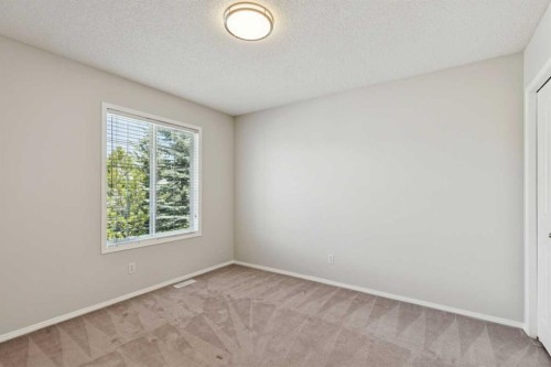 15 Springbank View Sw, Calgary, AB - Indoor Photo Showing Other Room