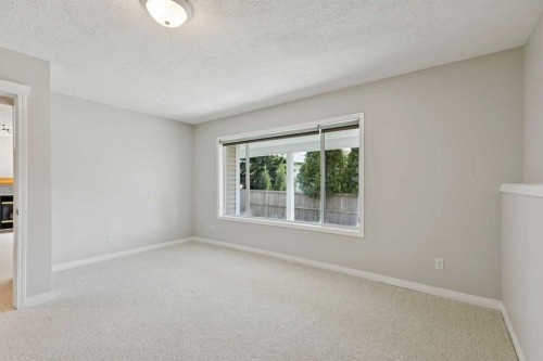 15 Springbank View Sw, Calgary, AB - Indoor Photo Showing Other Room