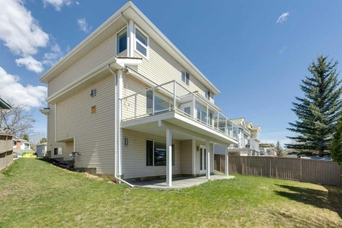 15 Springbank View Sw, Calgary, AB - Outdoor With Deck Patio Veranda