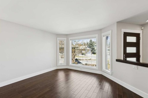 15 Springbank View Sw, Calgary, AB - Indoor Photo Showing Other Room