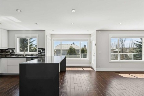 15 Springbank View Sw, Calgary, AB - Indoor Photo Showing Kitchen With Double Sink
