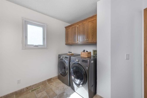 179 Scanlon Green Nw, Calgary, AB - Indoor Photo Showing Laundry Room
