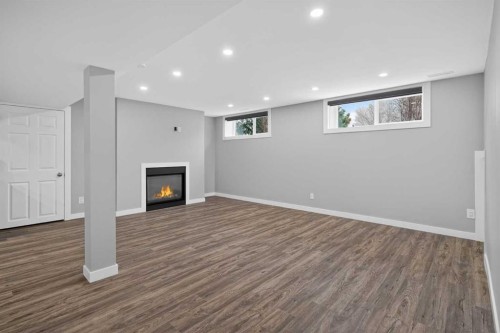 252 Allan Crescent Se, Calgary, AB - Indoor With Fireplace